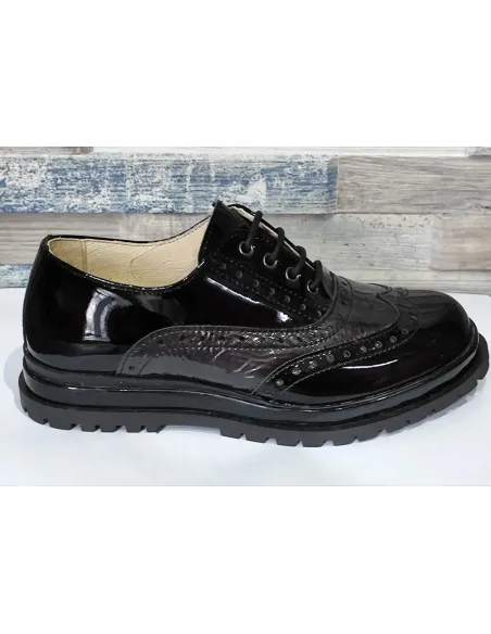 Charol negro con latón